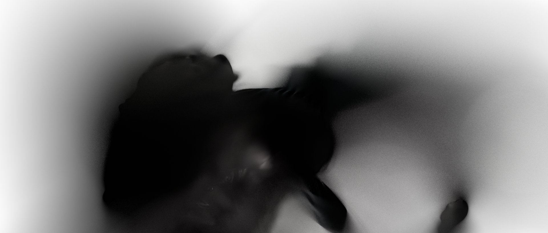Blurred creature graphic fragment.
